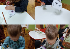 Dzieci kolorują maski kotów przy stolikach.
